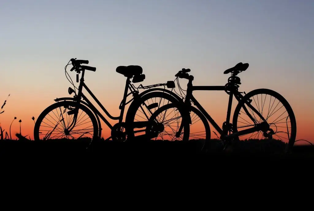 Photo of two bicycles at sunset. Photo taken by Pixabay at Pexels.