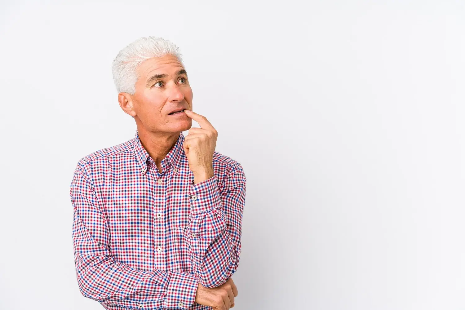 Photo of older man contemplating doubt and indecision.