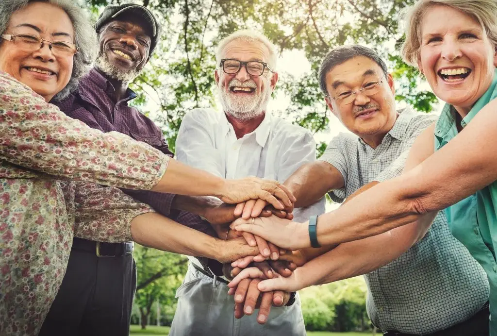 Photo of a happy group of older people.