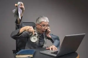 Photo of an older woman multitasking.
