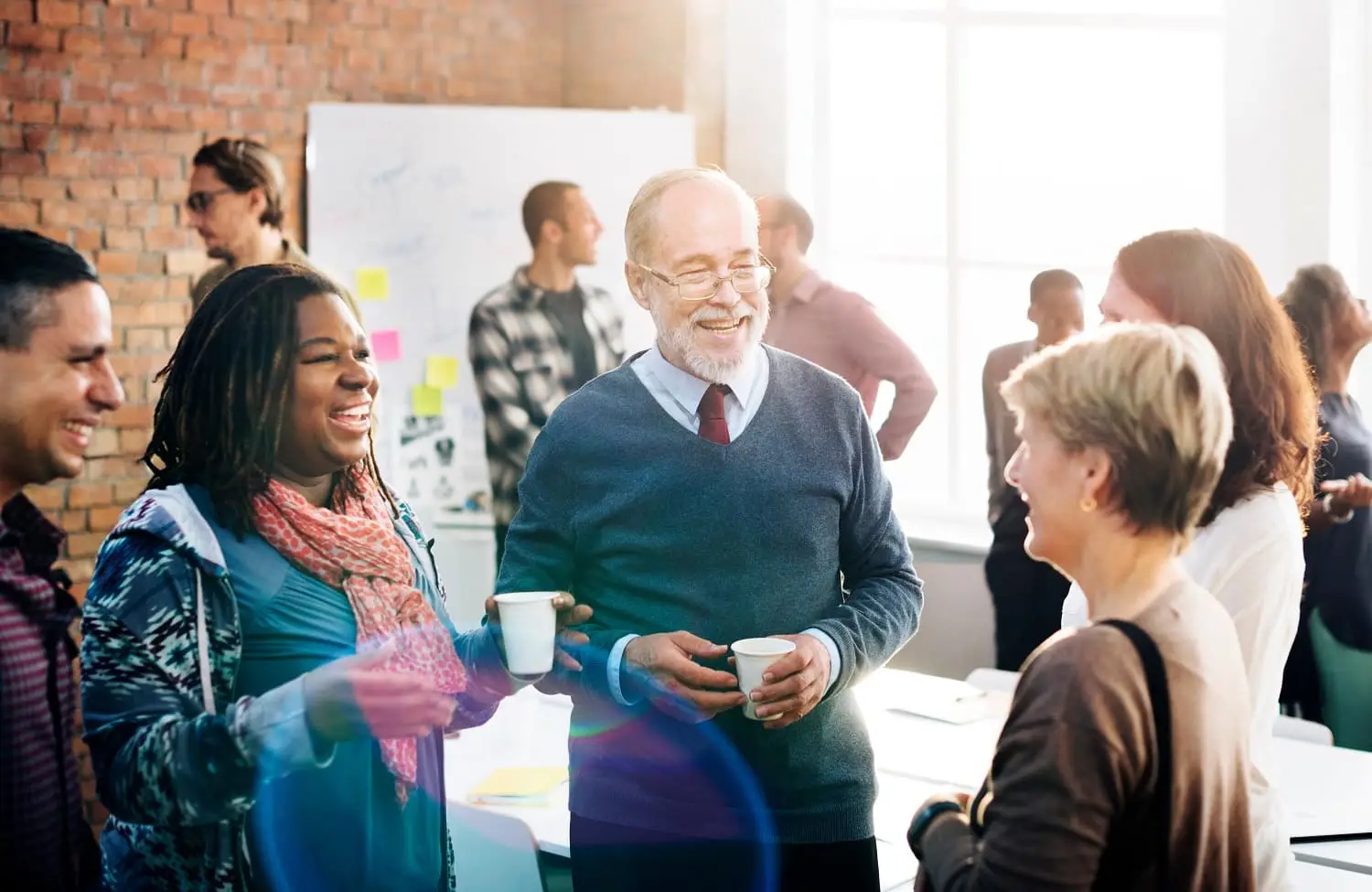 Photo of people in conversation.