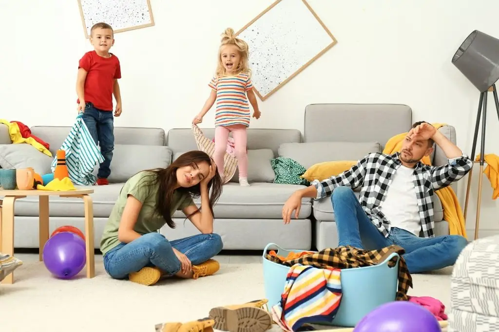 Photo of stressed-out younger parents.