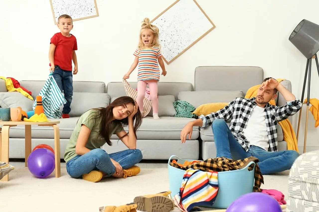 Photo of stressed-out younger parents.