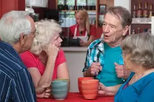 Photo of older people in discussion.