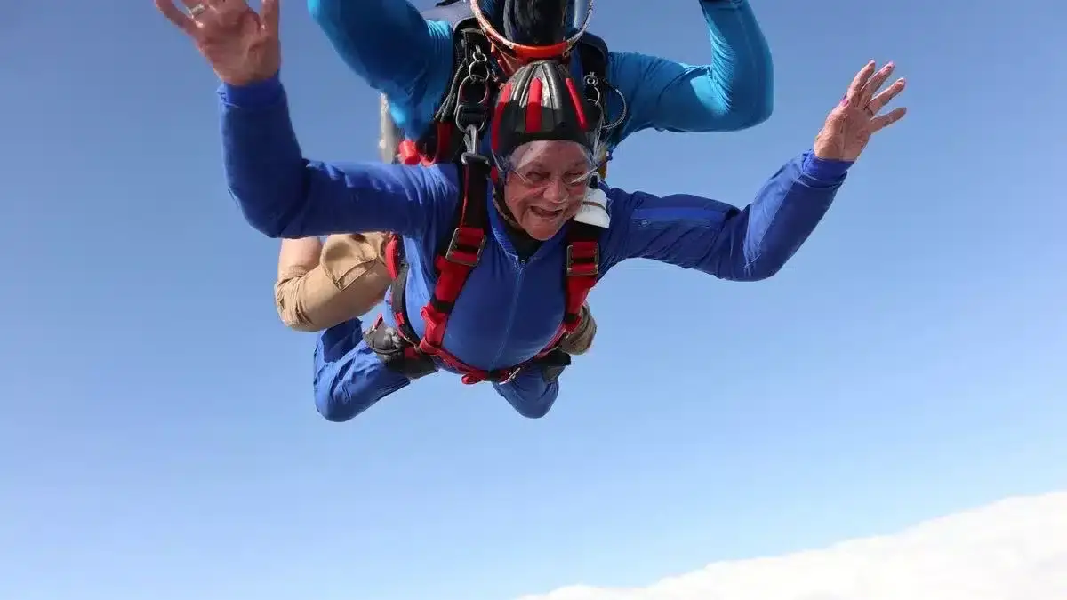 Photo of Hilary Oxley skydiving at age 90 - Photo by Photo by Chelsea Tooley with Skydive Headcorn.
