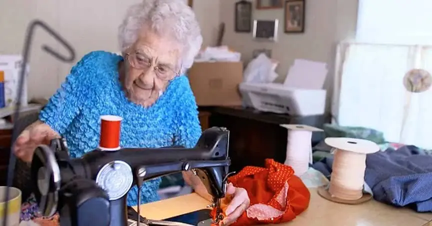 Photo of Eva, a 100-year-old seamstress.