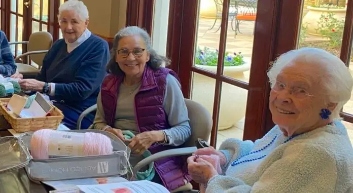 Photo of three Knit Wits from Edgemere senior living center.