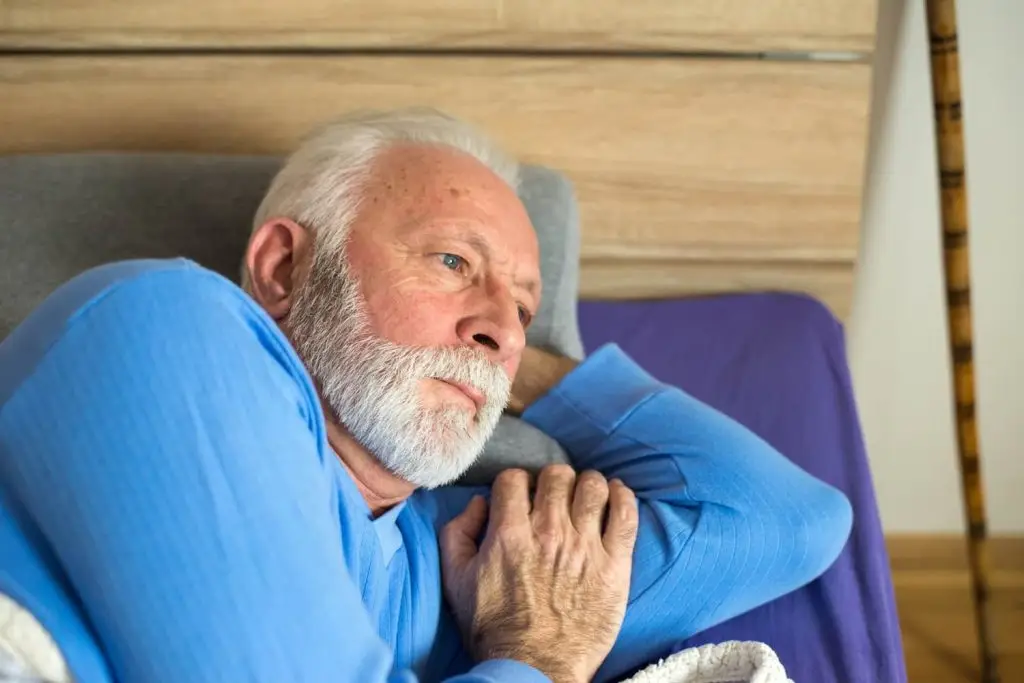 Photo of an unmotivated older man.