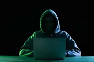 Image depicting an online thief, scammer or hacker.