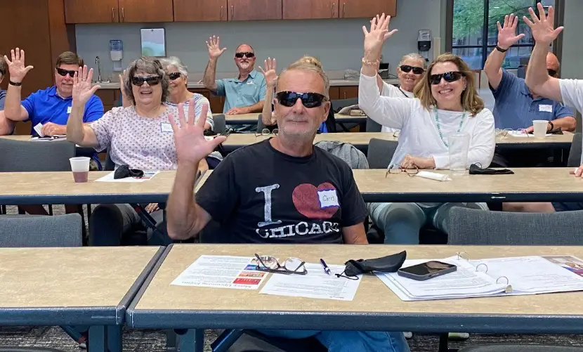 Chris Crawford, with Give 5 Class 26 during a partner visit - Photo by Give 5